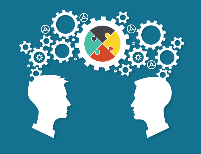 The heads of two people with gears and puzzles. The concept of teamwork. The idea to reach a solution. The file is saved in the version 10 EPS. This image contains transparency.